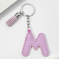 Detail of pink faux leather letter M keychain with matching tassel and metal ring - Pink Purple-Letter M