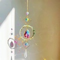 Golden suncatcher with green natural crushed stones and rainbow crystal heart prisms - Green Crystal