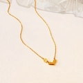 Minimalist gold titanium steel necklace featuring a polished solid heart pendant for women - Gold Letter E Heart