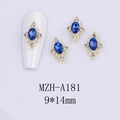 Detail of 9x14mm blue oval gemstone nail charm with gold frame and small white crystals - Gold Base Blue Stone(A181)