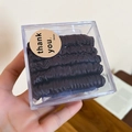 Close-up of five chocolate brown satin scrunchies in a clear square packaging box - Hair Tie - Dark Coffee (5Pcs Set)