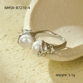 Detailed view of silver titanium steel open ring featuring two white pearls on stone tray - Lava Texture Medium Pearl Open Style (NMSR-B7210-4)