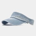 Detail view showing light blue washed denim texture and stitching on an open top sun visor - Adjustable / Light Blue