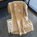 Elegant camel cashmere shawl with Eiffel Tower and heart pattern draped on wooden chair - Khaki Eiffel Tower(10113)