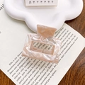 Rectangle acetate hair claw clip with beige marble texture for elegant styling - Water Ripple Orange