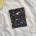 Black quilted sanitary pad pouch with orange floral print and white snap button - Black Apricot Floral