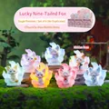 Translucent glowing Nine-Tailed Fox blind box figure on mossy forest landscape - Auspicious Nine-tailed Fox Set of 6 / Full Box Set