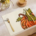Rectangular linen place mat featuring a hand-painted orange pumpkin design for Thanksgiving - Large Hand-painted Pumpkin