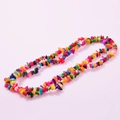 Natural multi-color shell chips necklace with vibrant irregular stones on pink background - Multicolor