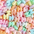 Macro view of H-shaped mini resin beads in vibrant macaron colors for DIY craft projects - Letter H (Random Mixed One) / Small
