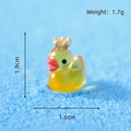Miniature resin luminous duck wearing a gold crown, yellow-green glowing desk decor - Cool Duck - Gold Crown