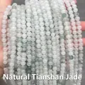 Detailed macro view of natural Tianshan Jade stone beads in light green and white tones - Natural Ice Jade 4mm (Approx. 90pcs) Strand