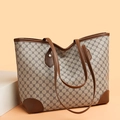 Grand sac cabas vintage avec motif monogramme et garniture en cuir marron élégant - Gris