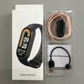 Smart Band 8 with pink replacement strap and magnetic USB charging cable set - M8 Magnetic Model - Pink (Hryfine)