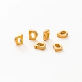 Detailed view of six gold-plated metal D-shaped letter beads with holes for DIY jewelry - Letter D / Gold