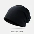 Minimalist solid black slouchy beanie hat for men and women in soft knitted fabric - Plain Style / Black