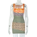 Detail of slim fit bodycon dress showing colorful patchwork patterns and elastic knit fabric - S / Patchwork Multi-color