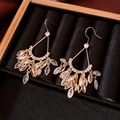 Close-up of 18k gold plated tassel earrings with sparkling marquise cut cubic zirconia - Ear Hook-Gold-Real Gold Plated