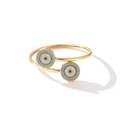 Golden bangle with blue and white zircon evil eye motifs in a bohemian style - 10426-Evil Eye Bangle