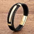 Detail of black braided leather bracelet with golden metal accents and magnetic clasp - Black Braided Gold Decoration