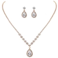 Detailed close-up of rose gold zircon necklace and teardrop earrings jewelry set - 2-Piece Set / Rose Gold