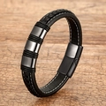 Modisches geflochtenes Lederarmband in Schwarz mit Metallringen auf Holzgrund - Gunmetal Ring Schwarzes Leder-Stil 3