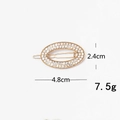 Detail view of rhinestone gold duckbill clip with dimensions 4.8cm and 2.4cm - Oval