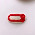 Handmade knitted oval hair clip in cream white with red bow and crochet texture - 15-Red Bowtie