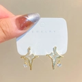 Elegant gold drop earrings with fluid star design and sparkling zircon inlays - Gold Cross Star Rhinestone Drop Style (K-217)