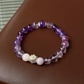 Elegant purple fluorite beaded bracelet with silver charm on dark leather background - 67# Purple Pandora