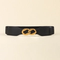Detail eines schwarzen elastischen Taillengürtels mit goldener Doppelring-Metallschnalle - Schwarz