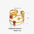 Himmelsthema Ring aus Gold-Edelstahl mit Sonne Mond Sternen und violetten Steinen - Sonne Mond Stern Stil / Gold