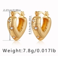 18K gold plated heart shaped hoop earrings with star engraving and white zircon inlay - Gold Heart Outline Zirconia Huggie (KE1207)