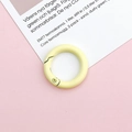 Macro shot of 25mm cream yellow spring ring clasp for DIY jewelry chains - Light Yellow