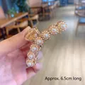 Golden metal hair claw with white pearl flower design, length approx 6.5cm - Flower Pearl