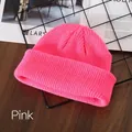 Pink knit beanie hat in ribbed wool with a minimalist cuffed design for winter - Pink