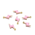 Macro detail of six pink enamel lightning bolt pendants with gold metal edges - Pink