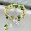 Green and clear beaded bracelet with a delicate metal butterfly charm on a mirror surface - S012-jade Shattered Butterfly Bracelet [green] #sz143