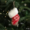 Red knitted Christmas stocking ornament with snowflake pattern and white faux fur trim - Knitted Boot Stocking