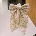 Barrette à cheveux beige avec nœud floral et longs rubans en tissu satiné élégant - Beige