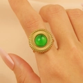 Vintage gold-plated stainless steel ring with a round green gemstone in a retro design - 162 X 1718k Gold Discs