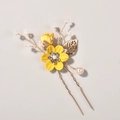 Macro view of bridal hair pin with handmade yellow fabric flower and gold metal leaf - 2-Flower Hairpin / Yellow