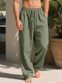 Detail of light green men's linen trousers with drawstring waist and elastic ankles - S / Army Green