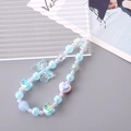 Charmante iriserende acryl telefoonbedel met blauwe strik kralen en roze hartje - Hart Strik Stijl (22cm Telefoonketting) / Blauw