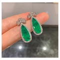 Pear-cut emerald green gemstone teardrop earrings with silver clover stud accent - Emerald Green Stud Earrings