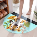 Semi-circular blue doormat with cartoon tiger design and Hello text in a home setting - Little Tiger