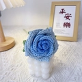 Handmade crochet bouquet with gradient blue rose and green leaves on decorative candle - Thai Rose Gradient Blue