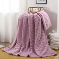Purple plush knit blanket draped over a golden metal chair in a cozy room setting - Monet Purple