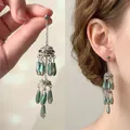 Detail of green teardrop tassel earrings with multi-layered vintage silver flower design - 16# Silver Earring Post - Gold - Blue