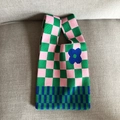 Knitted tote bag with green pink checkerboard pattern and blue floral detail - Pink Checkerboard